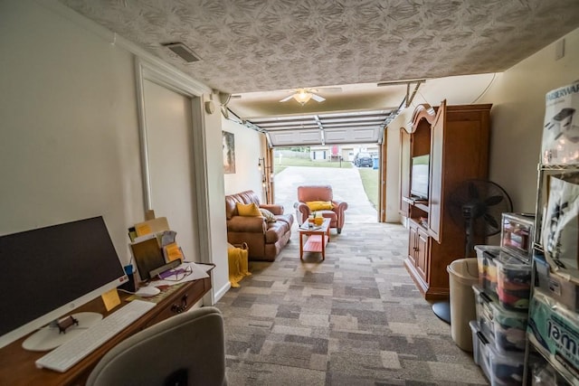 garage featuring a ceiling fan