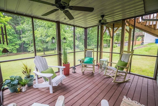 sunroom featuring ceiling fan