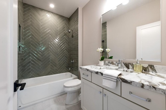 bathroom with vanity, shower / tub combination, and toilet