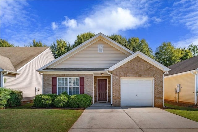 view of front of property with a front yard and a garage