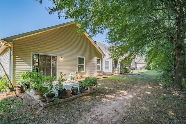 back of property with a patio area