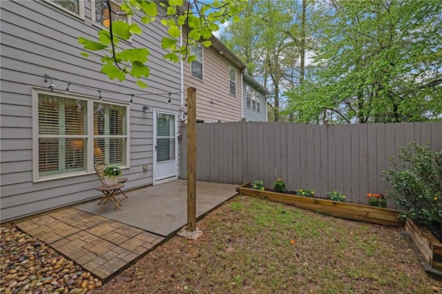 view of yard with a patio area and fence