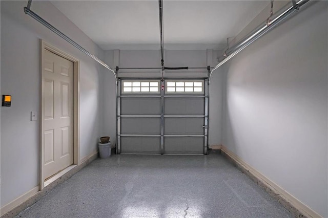 garage featuring baseboards