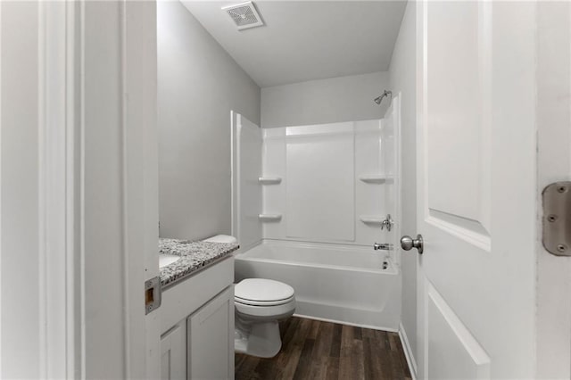 222 Parkland Way, Chatsworth, GA 30705 - full bath with vanity, wood finished floors, and shower / bath combination