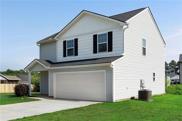 222 Parkland Way, Chatsworth, GA 30705 - view of front of house featuring an attached garage, a front yard, driveway, and roof with shingles