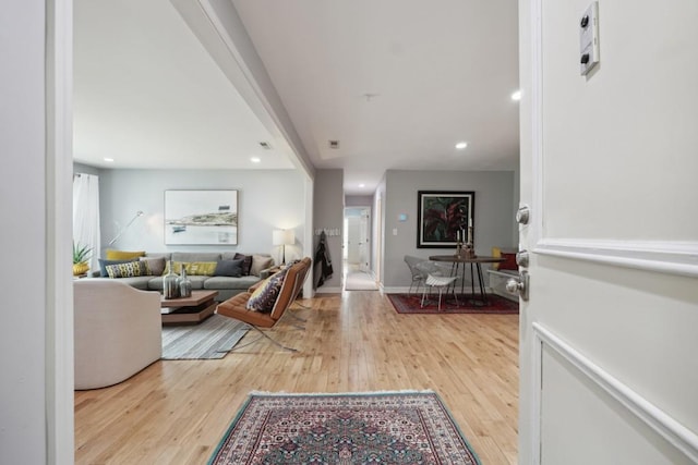 living room with light hardwood / wood-style floors