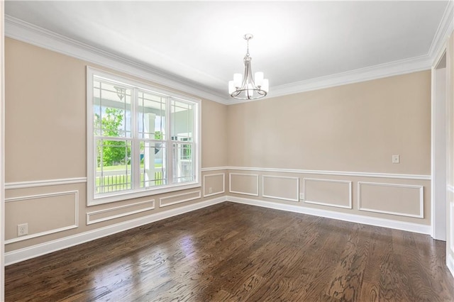 214 Westwind Dr, Newnan, GA 30263 - unfurnished room featuring a chandelier, ornamental molding, dark wood-style floors, a wainscoted wall, and a decorative wall