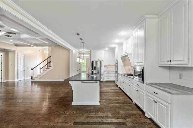 214 Westwind Dr, Newnan, GA 30263 - kitchen featuring appliances with stainless steel finishes, decorative backsplash, dark wood finished floors, white cabinets, and recessed lighting