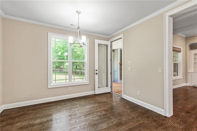 214 Westwind Dr, Newnan, GA 30263 - spare room with a chandelier, dark wood finished floors, ornamental molding, and baseboards