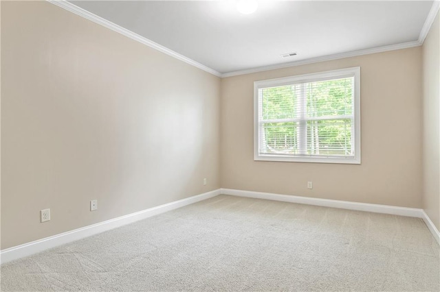 214 Westwind Dr, Newnan, GA 30263 - carpeted spare room with ornamental molding and baseboards