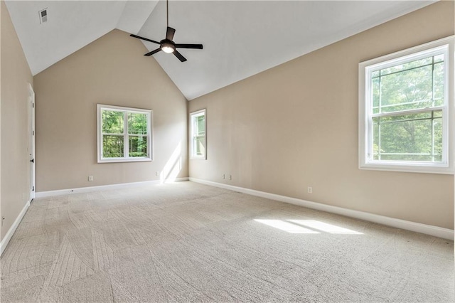 214 Westwind Dr, Newnan, GA 30263 - empty room with a ceiling fan, healthy amount of natural light, baseboards, and high vaulted ceiling