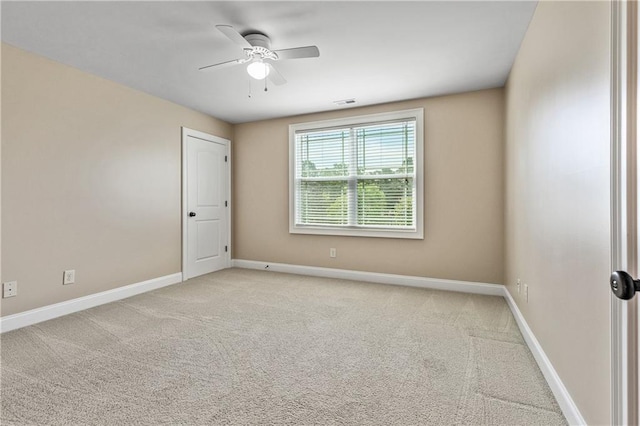214 Westwind Dr, Newnan, GA 30263 - spare room featuring ceiling fan, baseboards, and carpet