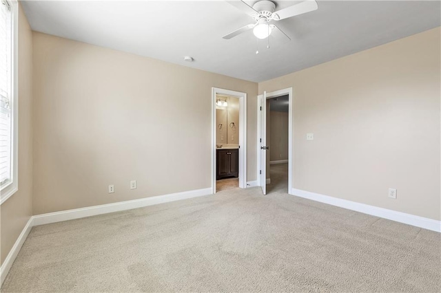 214 Westwind Dr, Newnan, GA 30263 - unfurnished room featuring baseboards, light carpet, a ceiling fan, and a smoke detector