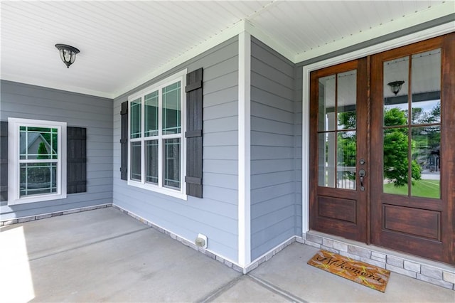 214 Westwind Dr, Newnan, GA 30263 - entrance to property featuring french doors and a porch