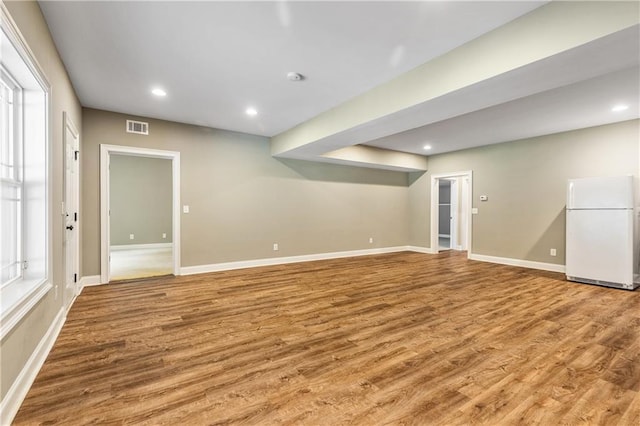 214 Westwind Dr, Newnan, GA 30263 - finished below grade area featuring freestanding refrigerator, wood finished floors, baseboards, and recessed lighting