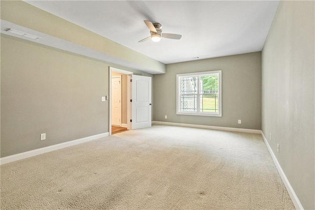 214 Westwind Dr, Newnan, GA 30263 - unfurnished room with a ceiling fan, light carpet, and baseboards