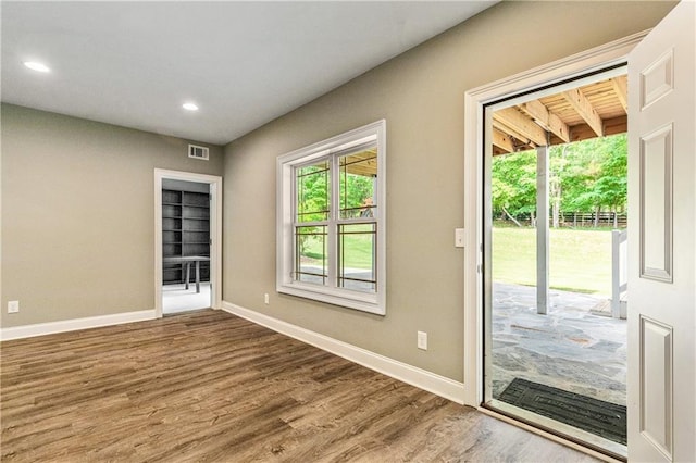 214 Westwind Dr, Newnan, GA 30263 - entryway with wood finished floors, baseboards, and recessed lighting