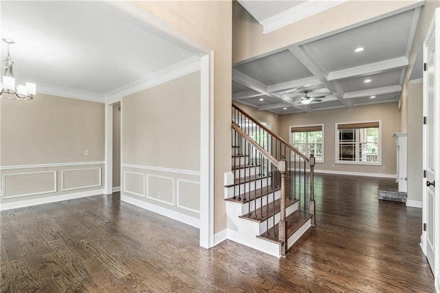214 Westwind Dr, Newnan, GA 30263 - stairway featuring wood finished floors, beam ceiling, a ceiling fan, a chandelier, and crown molding