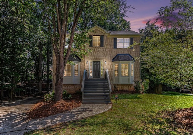 3440 Oaktree Way, Stonecrest, GA 30038 - view of front of home featuring a yard and brick siding
