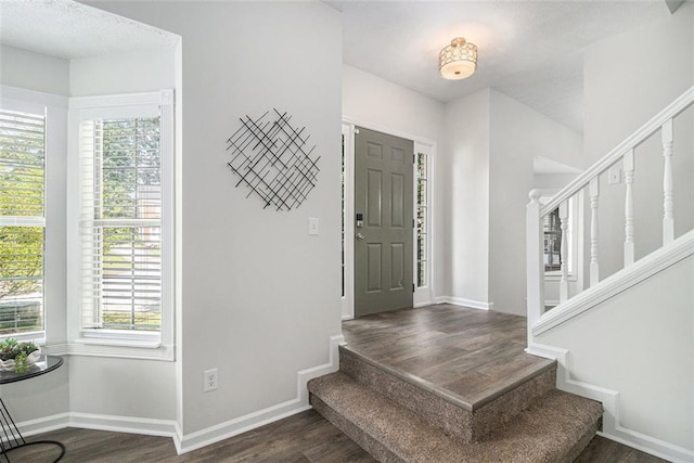 3440 Oaktree Way, Stonecrest, GA 30038 - entryway featuring stairway and dark wood finished floors