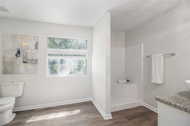 3440 Oaktree Way, Stonecrest, GA 30038 - full bath featuring wood finished floors, vanity, and a shower