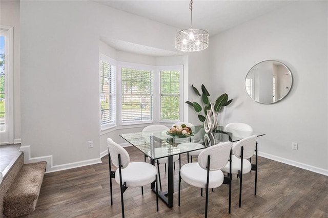 3440 Oaktree Way, Stonecrest, GA 30038 - dining area featuring wood finished floors and a chandelier