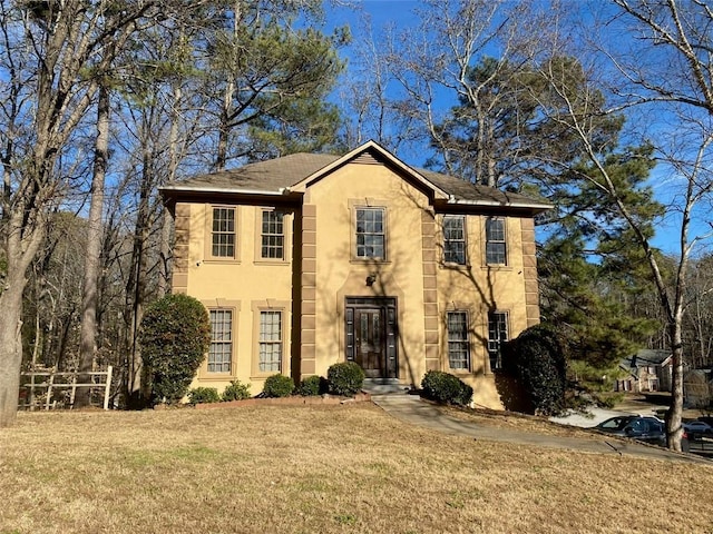 view of front of property with a front lawn