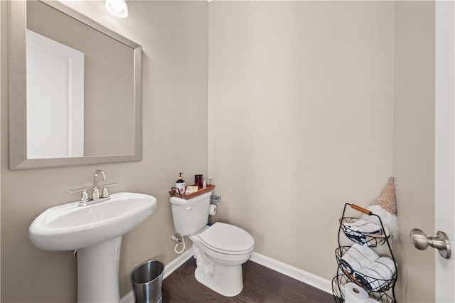 20057 Windalier Way, Roswell, GA 30076 - bathroom with baseboards and wood finished floors