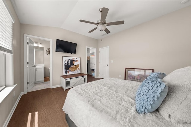 20057 Windalier Way, Roswell, GA 30076 - bedroom featuring vaulted ceiling, multiple windows, wood finished floors, ceiling fan, and connected bathroom