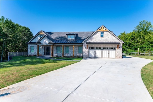 craftsman-style home with a front yard and a garage