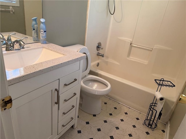 bathroom featuring vanity, shower / bath combination, and toilet