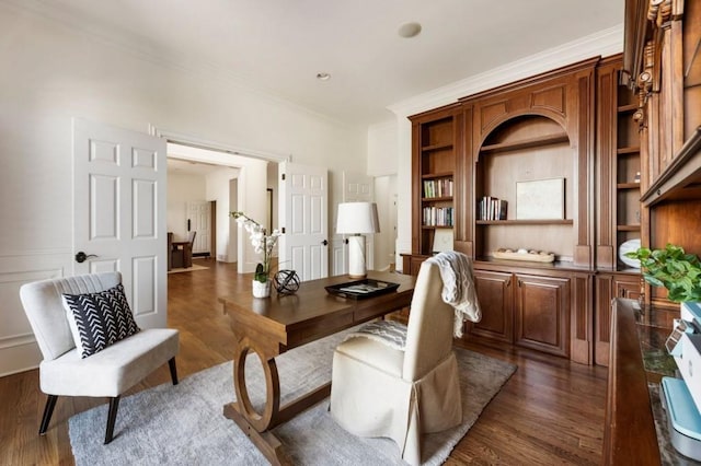 2250 Blackheath Trce, Alpharetta, GA 30005 - home office featuring ornamental molding, dark wood-type flooring, and built in shelves