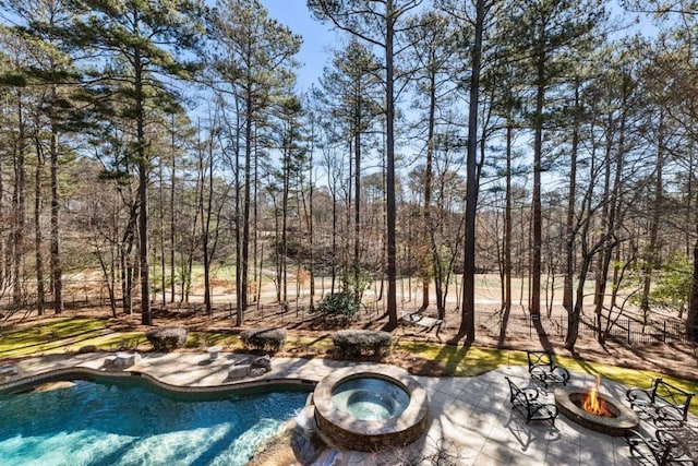 2250 Blackheath Trce, Alpharetta, GA 30005 - swimming pool featuring a fire pit, an in-ground hot tub, and a patio area