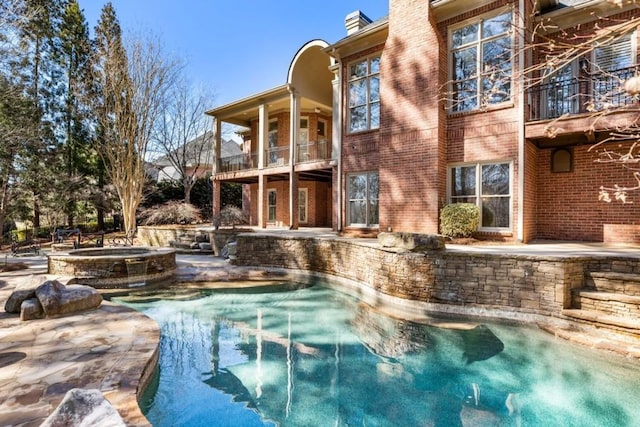 2250 Blackheath Trce, Alpharetta, GA 30005 - view of swimming pool featuring a patio and a pool with connected hot tub