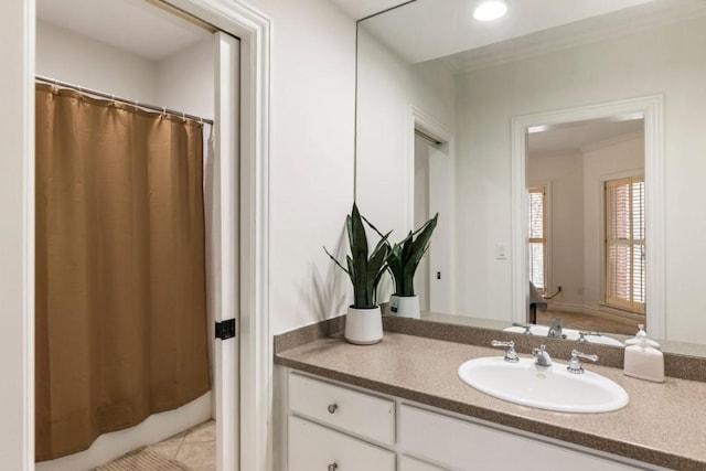 2250 Blackheath Trce, Alpharetta, GA 30005 - bathroom featuring vanity, ornamental molding, curtained shower, and tile patterned floors