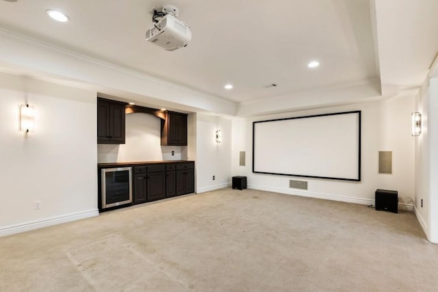 2250 Blackheath Trce, Alpharetta, GA 30005 - home theater with beverage cooler, light carpet, a tray ceiling, ornamental molding, and recessed lighting