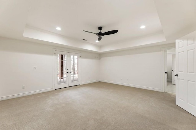 2250 Blackheath Trce, Alpharetta, GA 30005 - empty room with a tray ceiling, a ceiling fan, light colored carpet, french doors, and recessed lighting