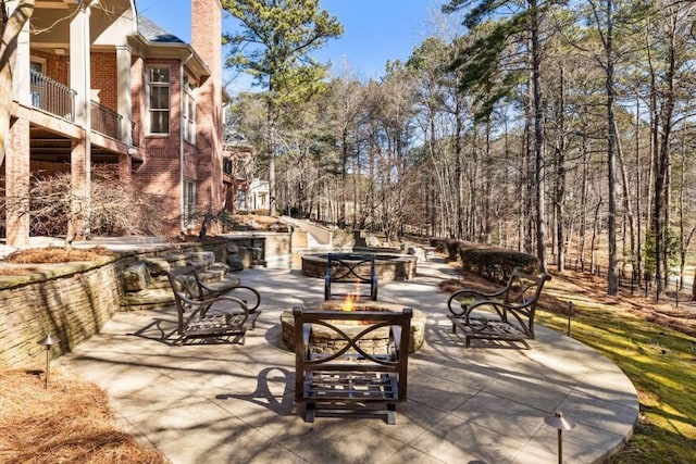2250 Blackheath Trce, Alpharetta, GA 30005 - patio / terrace with a fire pit and a patio area
