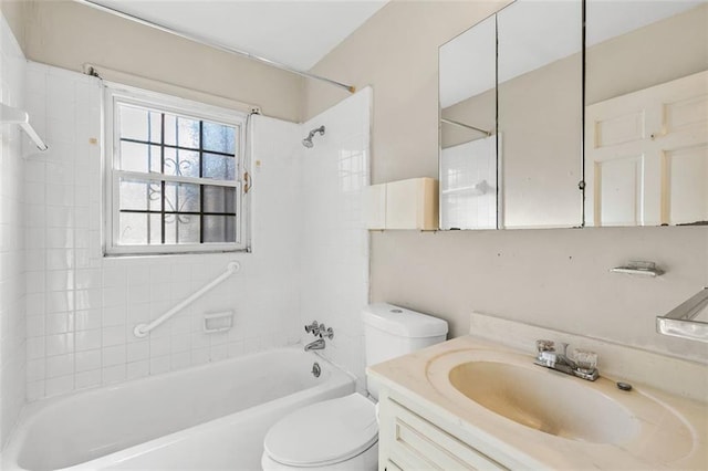 full bath with tub / shower combination, vanity, and toilet