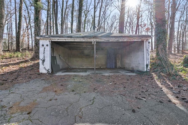 exterior space featuring driveway and a carport