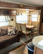 dining area with dark hardwood / wood-style floors