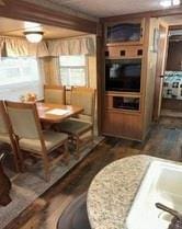 dining room featuring dark wood-type flooring