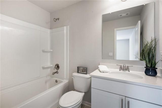 full bathroom with vanity, toilet, and washtub / shower combination