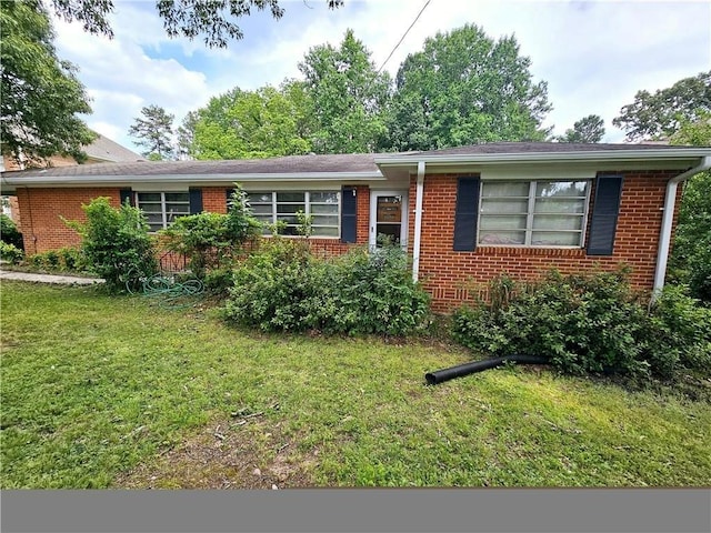 2480 Sewell Mill Rd, Marietta, GA 30062 - ranch-style house with a front lawn and brick siding