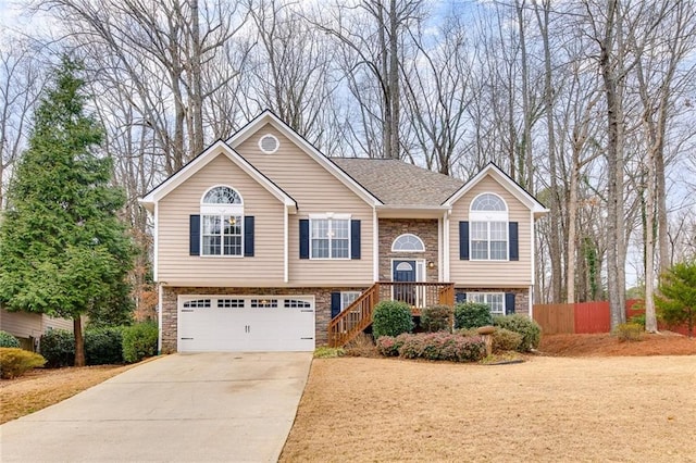 bi-level home featuring a garage