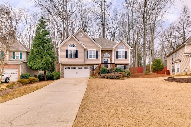 split foyer home featuring a garage