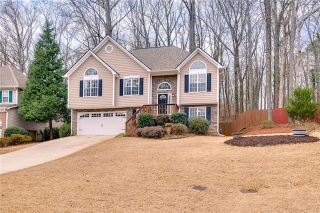 bi-level home featuring a garage