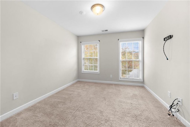 view of carpeted spare room