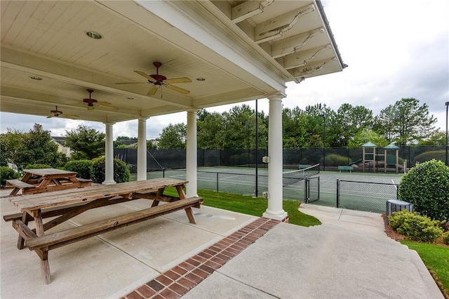 exterior space featuring central AC, ceiling fan, and tennis court