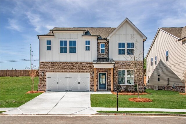 4202 Adler Cir, Buford, GA 30519 - view of front of property featuring board and batten siding, brick siding, a garage, and concrete driveway